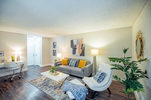 a living room with a couch and a table